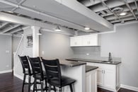 Remodeled basement in Libertyville, Illinois with hardwood floors and kitchen.