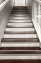 Remodeled basement in Libertyville, Illinois with hardwood floor stairwell.