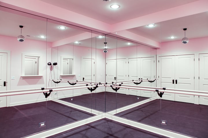 mirrored room with dance floor