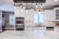 Lighting with personality - beautiful remodeled kitchen