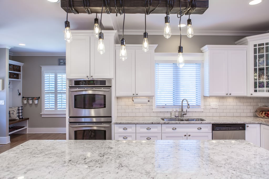 Lighting with personality - beautiful remodeled kitchen