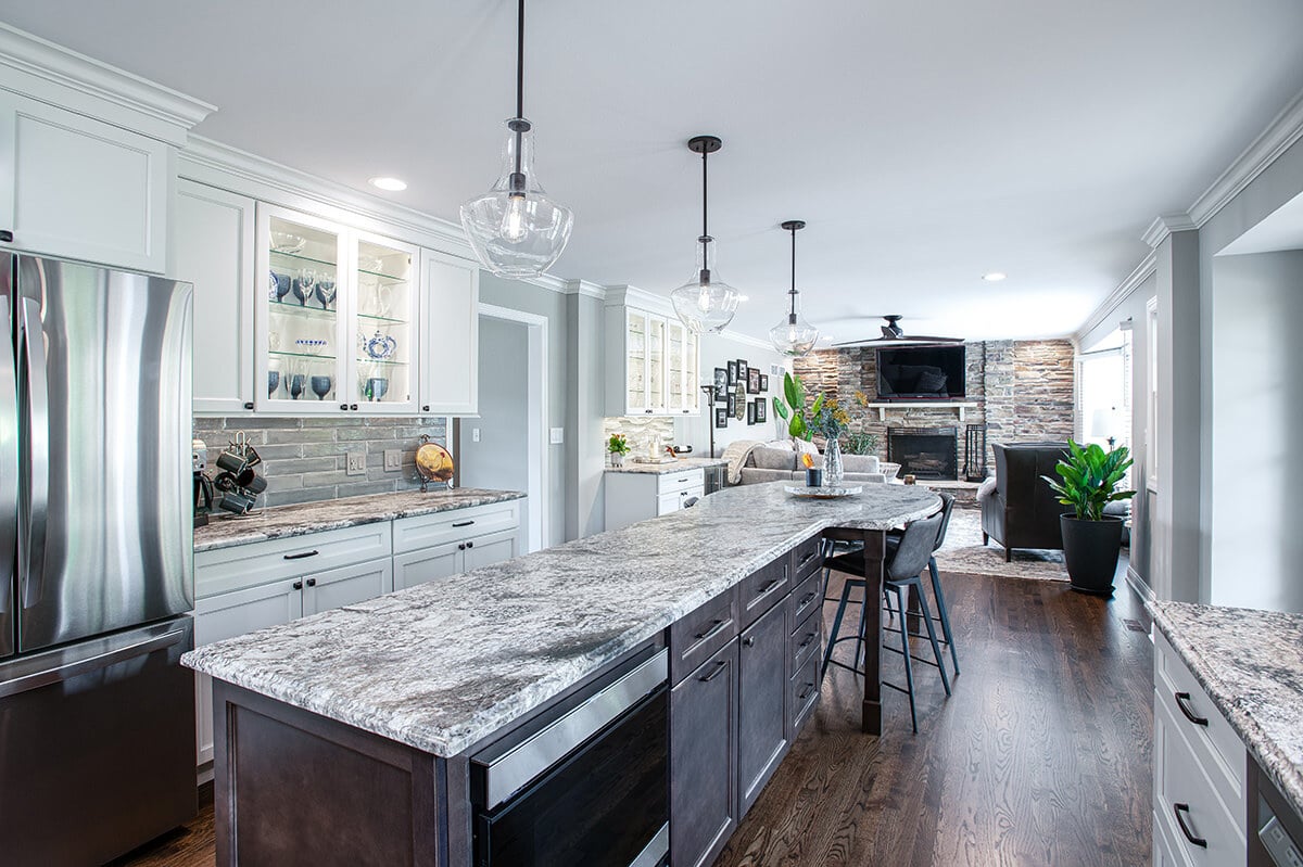 Updated first floor home with wood floors, white cabinet surrounds and a beautiful island.