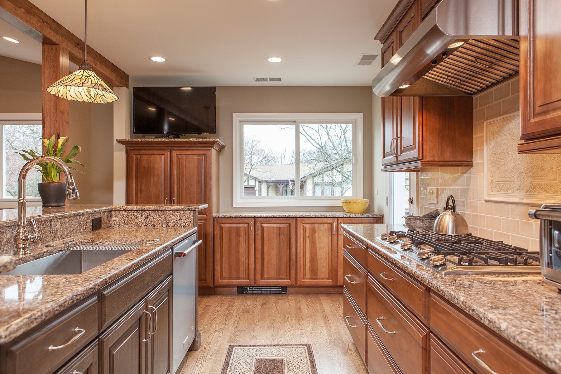 Kitchen remodel with wood cabinets and new countertops in Glenview, Illinois