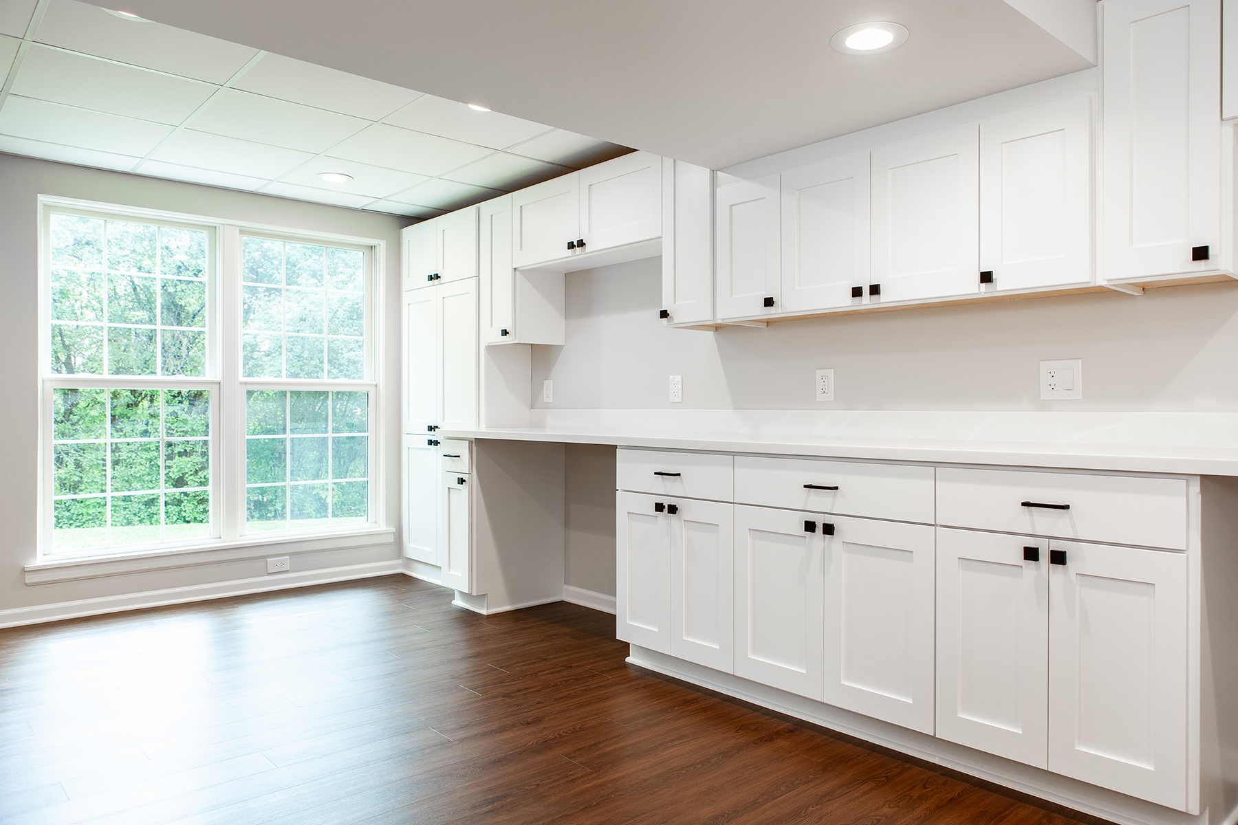 Basement remodel with lots of natural light and custom cabinetry. 
